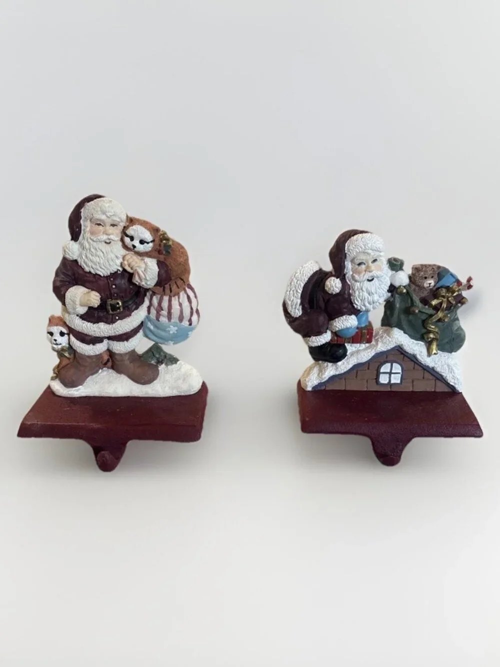 2 Vintage Trim a Home Cast Iron and Resin Stocking Holder Santa Claus & Snowman